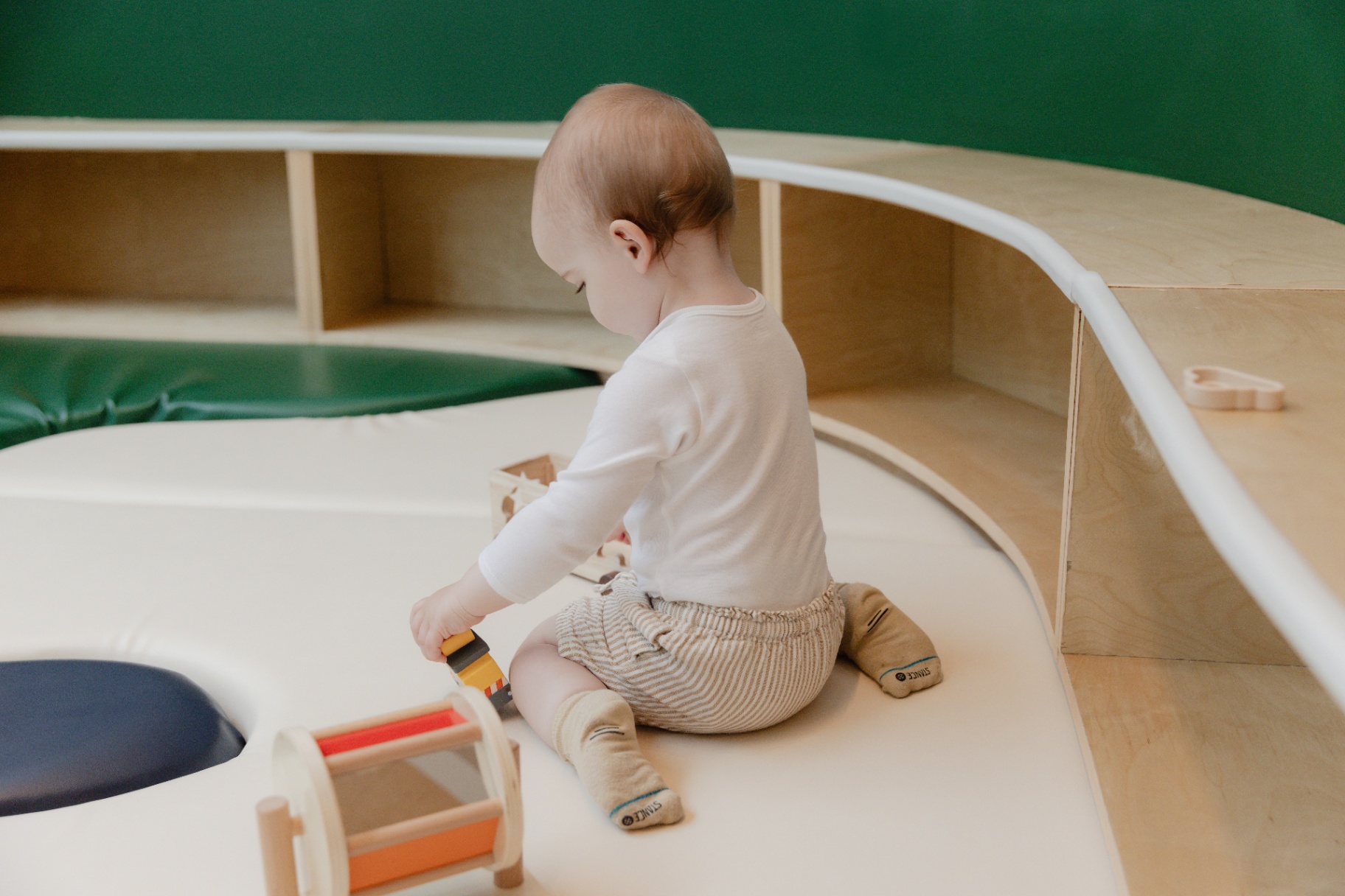 House of Wonder neon cloud sign above the Scandinavian-inspired play cafe entrance in Brooklyn
