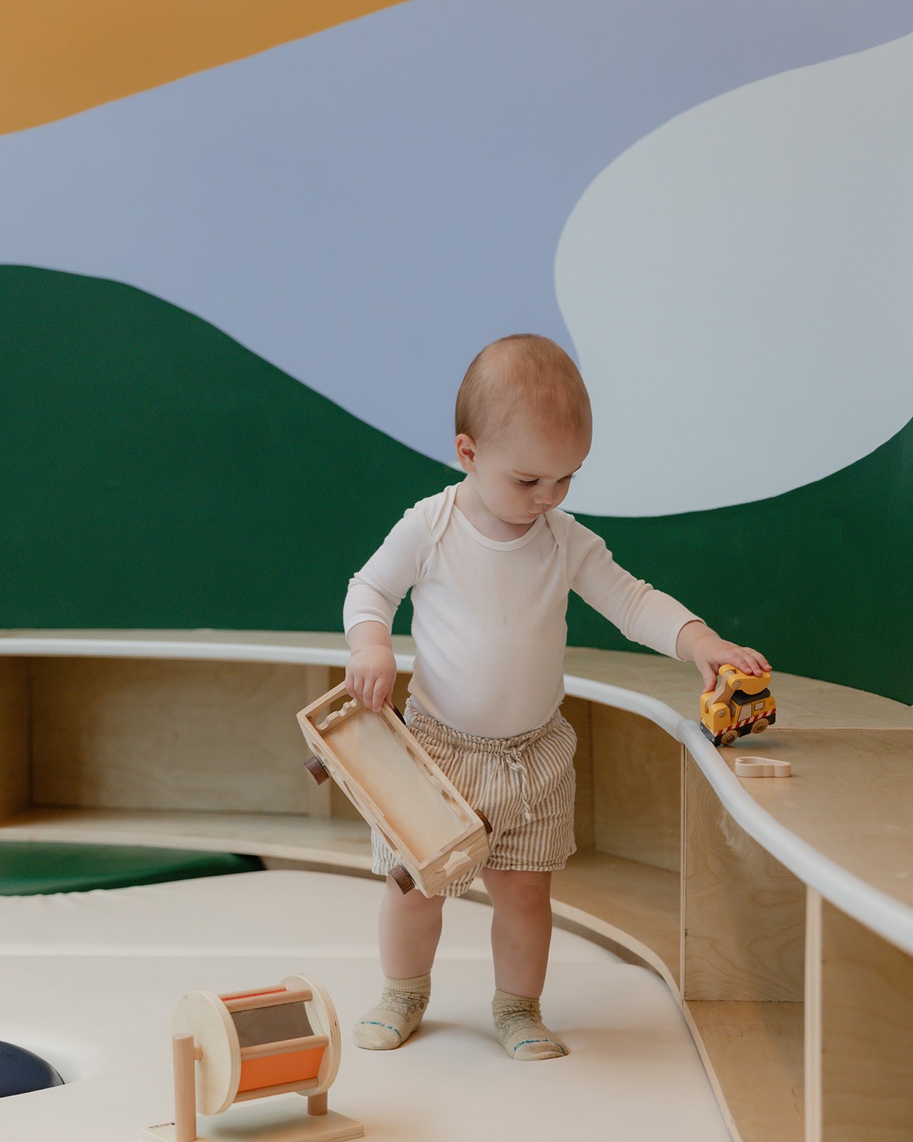 Toddlers exploring the indoor play zones at House of Wonder Brooklyn